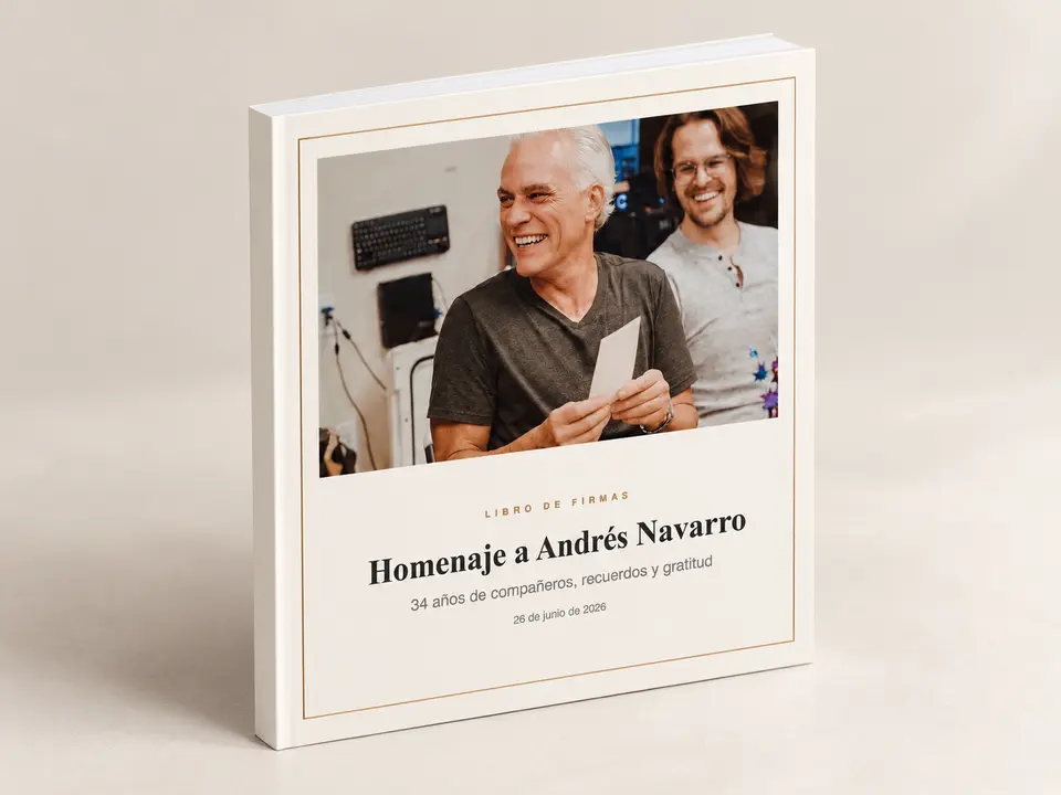 Representación de un libro fino cerrado con la portada «Homenaje a Andrés Navarro»